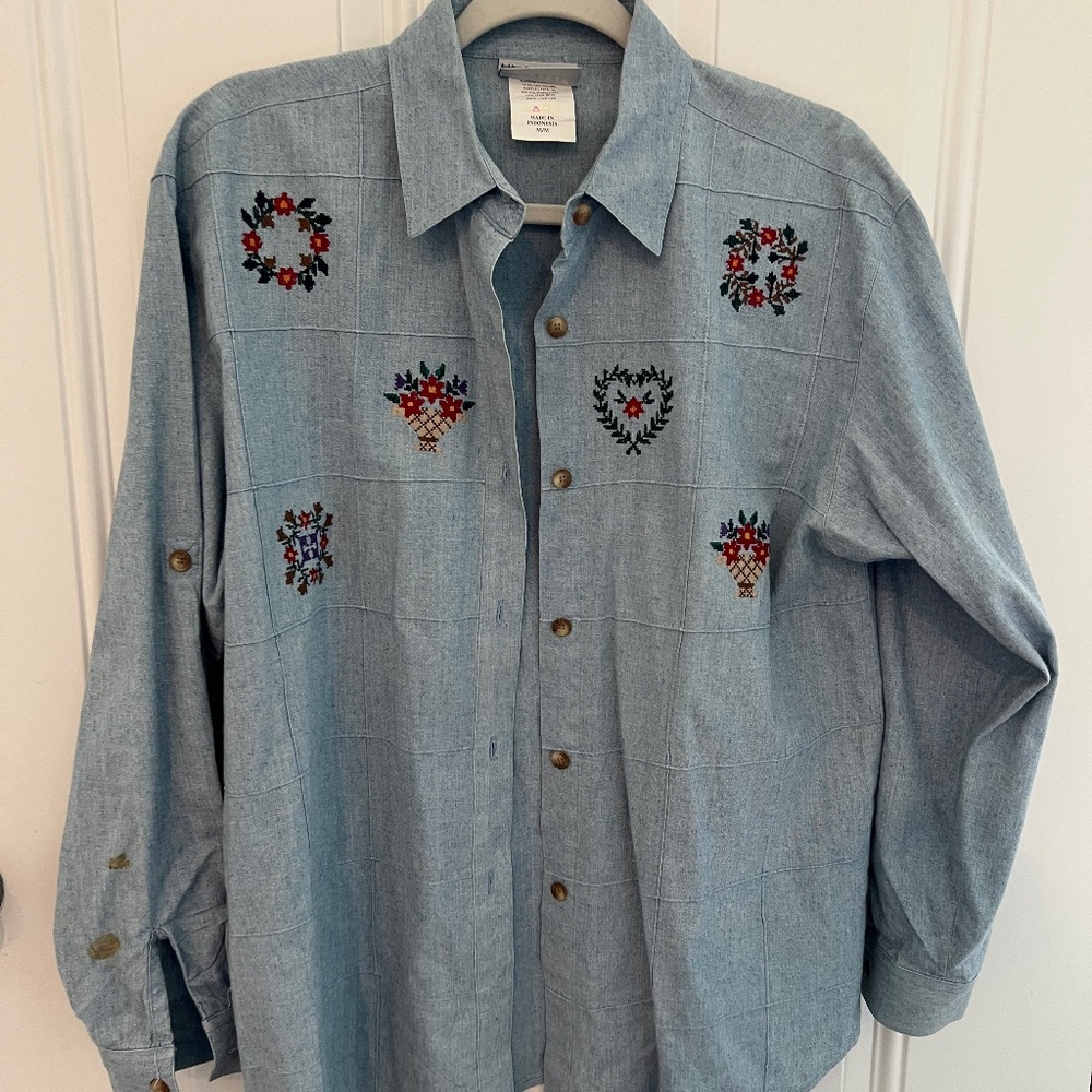 Soft blue denim type long sleeve shirt with embroidery type details